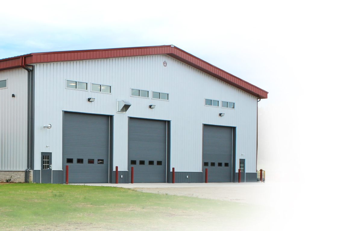 3 Garage Doors on Post-Frame Commercial Building 3 Garage Doors on Post-Frame Commercial Building