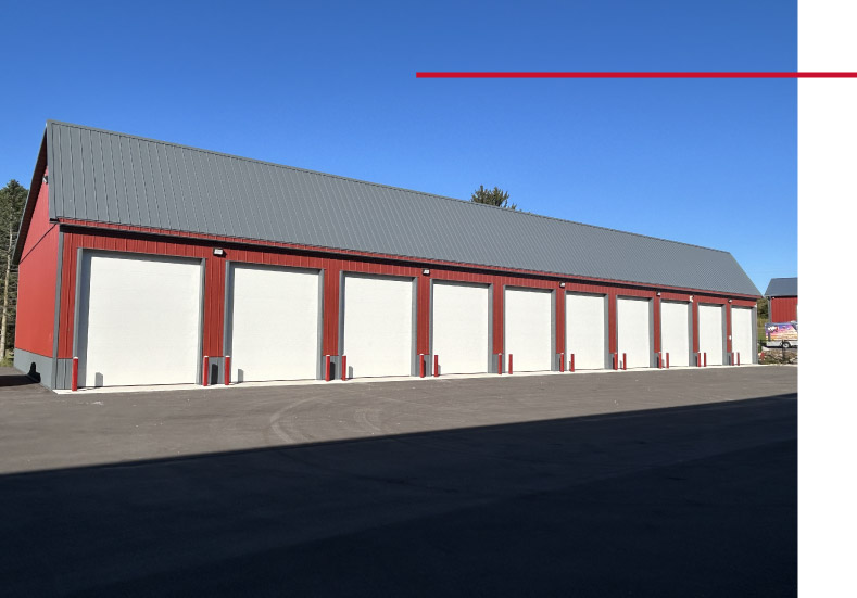 Many Garage Doors on Lone Silo Storage Building