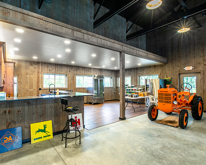 Inside Hobby Shop With Recreation Area and Storage for Tractor
