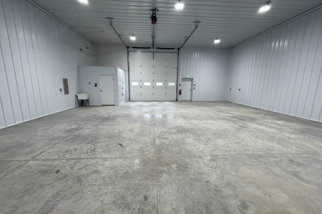 Each unit includes a private bathroom, utility sink, and dedicated electric panel—simple, functional, and ready for business.