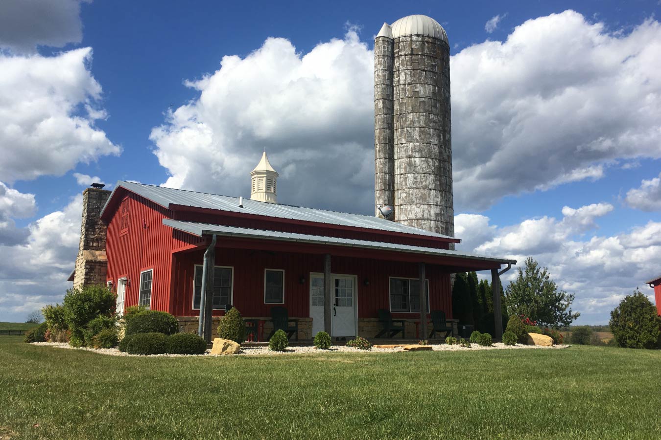 Front View of House With Silo Behind